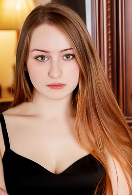 Evelin Her Soft Breasts Bare And Her Mesmerizing Blue Eyes Shining Seductively