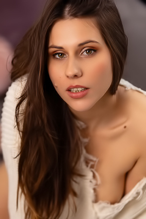 Amber Slassh Teases With Perky Nipples And Spread Legs On The Couch