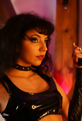 Mitzi X Explores Her Kinky Side In A Dungeon With Masturbation And Dominant Poses